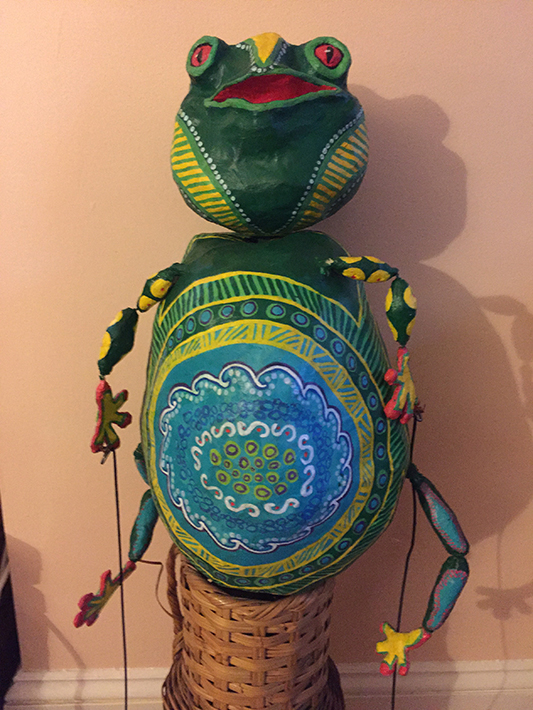 Frog puppet made with papier mache 24” high,  for performance of “The Greedy Frog”